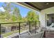 Private balcony overlooking tranquil backyard and water at 2550 Venetian Way, Winter Park, FL 32789
