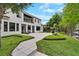 Spacious backyard with patio and lush landscaping at 2550 Venetian Way, Winter Park, FL 32789