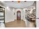 Elegant entryway with high ceilings and wood door at 2550 Venetian Way, Winter Park, FL 32789