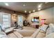 Home theater with sectional sofa and entertainment center at 2550 Venetian Way, Winter Park, FL 32789