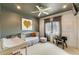Bedroom with crib, changing table, and neutral decor at 2550 Venetian Way, Winter Park, FL 32789