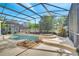 Relaxing screened-in pool and spa area at 2714 Portchester Ct, Kissimmee, FL 34744