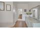 Elegant bathroom with a large mirror and light wood cabinets at 5125 Formby Dr, Orlando, FL 32812