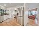 Modern kitchen with stainless steel appliances and terracotta floors at 5125 Formby Dr, Orlando, FL 32812