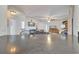 View of living room from kitchen island with dark countertop at 5125 Formby Dr, Orlando, FL 32812