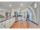 Kitchen with stainless steel appliances and white cabinets at 5125 Formby Dr, Orlando, FL 32812