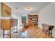 Bright study with terracotta tile floors, built-in shelving, and comfortable seating at 5125 Formby Dr, Orlando, FL 32812