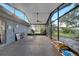 Spacious screened porch with ceiling fan, perfect for relaxing outdoors at 5125 Formby Dr, Orlando, FL 32812
