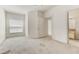 Bright bedroom with a window, carpet, and access to a bathroom at 5953 Westgate Dr # 1823, Orlando, FL 32835