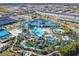 Community featuring a large pool, water park, and sports courts at 617 Jasmine Ln, Davenport, FL 33897