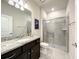 Bathroom with granite vanity and large walk-in shower at 617 Jasmine Ln, Davenport, FL 33897