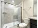 Clean bathroom with shower/tub combo and granite vanity at 617 Jasmine Ln, Davenport, FL 33897