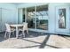 Patio with table and chairs, overlooks pool at 617 Jasmine Ln, Davenport, FL 33897