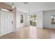 Dining room features tile floors, sliding glass doors, and neutral walls at 6402 S Goldenrod Rd # 1B, Orlando, FL 32822