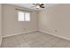Simple bedroom with tile flooring, ceiling fan, and window coverings at 725 Northlake Blvd # 45, Altamonte Springs, FL 32701