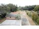 Aerial view of property with detached workshop and large lot at 9745 Ne 306Th Ct, Fort Mc Coy, FL 32134