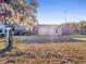 Brick home with large backyard, overlooking a grassy area at 9745 Ne 306Th Ct, Fort Mc Coy, FL 32134