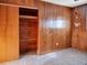 Bedroom closet with cedar lined walls and sliding doors at 9745 Ne 306Th Ct, Fort Mc Coy, FL 32134