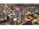 Nighttime aerial view of a modern highrise building with city lights at 155 S Court Ave # 2609, Orlando, FL 32801