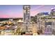 Night view of high-rise building in city center at 155 S Court Ave # 2609, Orlando, FL 32801
