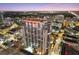 Highrise building at dusk, aerial view, city lights at 155 S Court Ave # 2609, Orlando, FL 32801
