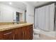 Bathroom with granite countertop and shower/tub combo at 155 S Court Ave # 2609, Orlando, FL 32801
