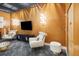 Stylish clubhouse with comfortable seating and a large TV at 155 S Court Ave # 2609, Orlando, FL 32801