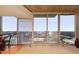 Living room with hardwood floors and stunning city views at 155 S Court Ave # 2609, Orlando, FL 32801