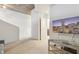 Spacious living room with large TV and city view at 155 S Court Ave # 2609, Orlando, FL 32801