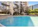Inviting resort-style pool with ample lounge chairs at 155 S Court Ave # 2609, Orlando, FL 32801