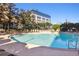 Inviting resort-style pool with plenty of lounge chairs at 155 S Court Ave # 2609, Orlando, FL 32801