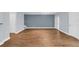 Spacious living room with hardwood floors, and neutral walls at 204 E South St # 1055, Orlando, FL 32801
