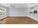 Bright living room featuring hardwood floors and a ceiling fan at 204 E South St # 1055, Orlando, FL 32801