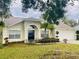 Single-Gathering home with a well-manicured lawn at 218 Meadow Green Dr, Davenport, FL 33837