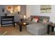 Living room features a sectional sofa and coffee table at 3128 Sun Lake Ct # A, Kissimmee, FL 34747