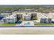 Aerial view of the complex, showcasing the pool and beach access at 4175 S Atlantic Ave # 1240, New Smyrna Beach, FL 32169