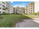 Landscaped courtyard with walkway between residential buildings at 4175 S Atlantic Ave # 1240, New Smyrna Beach, FL 32169