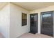 Condo entry with door and screen door at 4175 S Atlantic Ave # 1240, New Smyrna Beach, FL 32169