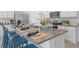 Kitchen with island, granite counters, stainless steel appliances at 4185 Singing Mockingbird Blvd, Bartow, FL 33830