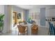Bright dining area with sliding door access to backyard at 4185 Singing Mockingbird Blvd, Bartow, FL 33830
