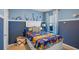 bedroom with nautical theme bedding and decor at 4185 Singing Mockingbird Blvd, Bartow, FL 33830