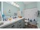 Bathroom with vanity, shower, and toilet at 6807 Sylvan Woods Dr, Sanford, FL 32771