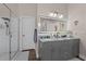 Bathroom with double vanity and walk-in shower at 6807 Sylvan Woods Dr, Sanford, FL 32771