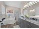 Bathroom with double vanity and soaking tub at 6807 Sylvan Woods Dr, Sanford, FL 32771