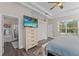 Main bedroom with ensuite bathroom and pool view at 6807 Sylvan Woods Dr, Sanford, FL 32771
