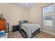 Guest bedroom with full-size bed and dresser at 6807 Sylvan Woods Dr, Sanford, FL 32771