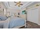Main bedroom with king-size bed and large closet at 6807 Sylvan Woods Dr, Sanford, FL 32771