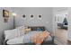Versatile bedroom with daybed and home office setup at 6807 Sylvan Woods Dr, Sanford, FL 32771