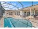 Spacious kidney shaped pool with screened enclosure at 6807 Sylvan Woods Dr, Sanford, FL 32771