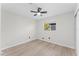 Spacious bedroom with light wood floors and ceiling fan at 745 Maloney Ln, Orlando, FL 32825